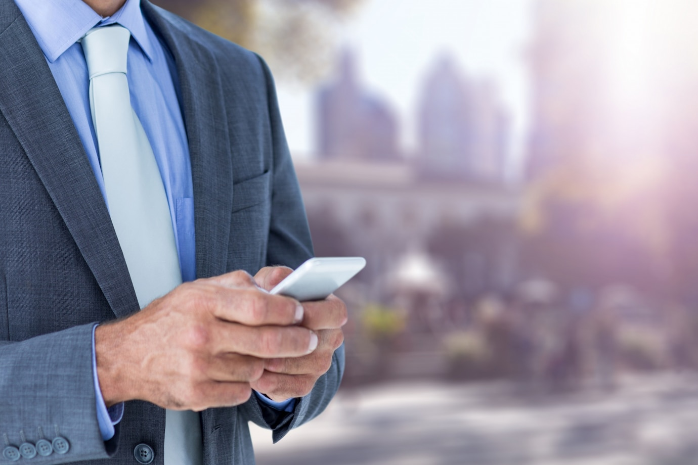 close-up-businessman-using-his-smartphone_1134-586